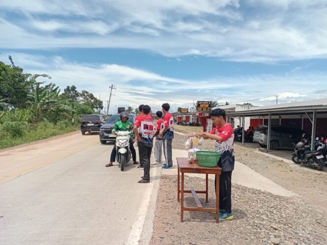 
					Lebih Dekat dengan Masyarakat, LPK Kaizu Hamagi Gakkou Berbagi Jumat Berkah